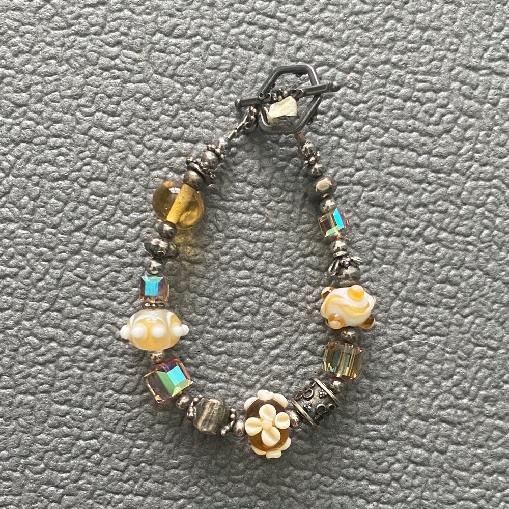 Elegant Beaded Bracelet with Silver and Gold Accents